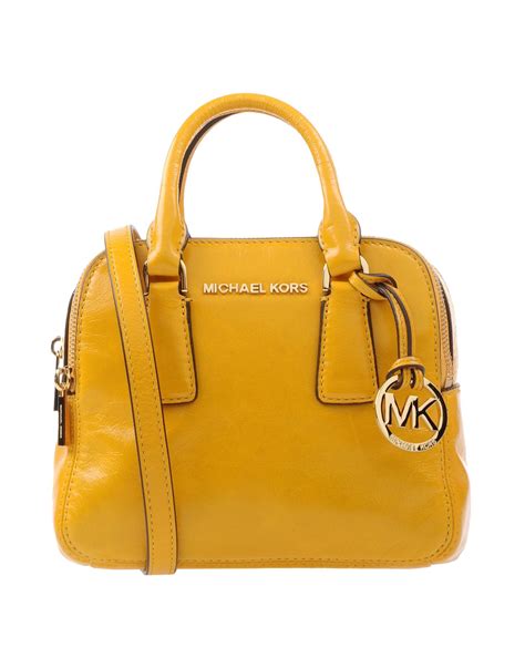 michael kors yellow purse large chain|Michael Kors bag with chain.